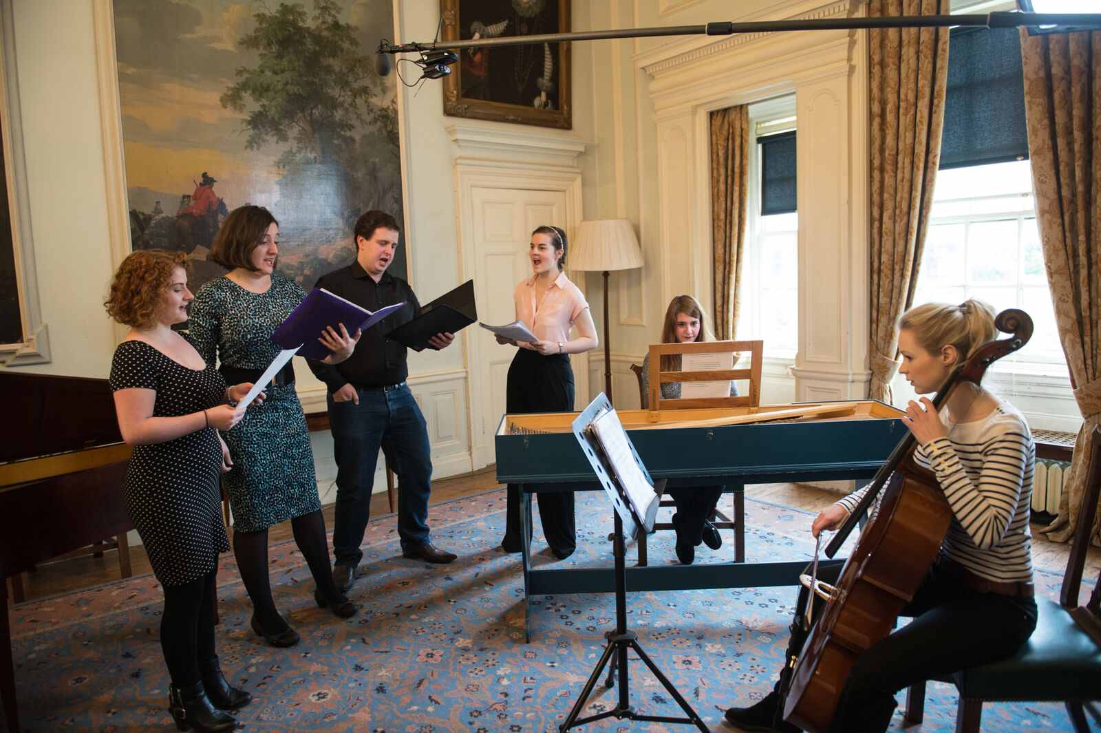 Colour photograph showing Jonathan Forbes Kennedy, baritone, recording an historically-informed performance with colleagues from Burns Period Performance Project (photo credit: AHRC-funded Editing Burns for the 21st Century research project)